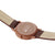 Montre unisexe Mondaine avec bracelet en cuir marron ; fond du boîtier imprimé.