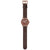 Montre unisexe Mondaine sur bracelet en cuir marron ; cadran rond, barrette et points de fixation.