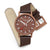 Montre unisexe Mondaine avec bracelet en cuir marron ; cadran marron, accents rouges, boucle réglable.