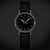 Mondaine Stop2go Damenuhr frontal: schwarzes Zifferblatt, schwarzes Lederarmband
