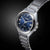 Montre pour homme avec bracelet en acier inoxydable et cadran bleu, boîtier rond avec index
