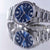 Herrenarmbanduhr blau, Nahansicht von Zifferblatt und Metallarmband mit Automatiktext