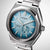 Montre bracelet homme avec boîtier argenté et cadran turquoise, automatique