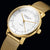 Montre pour femme dorée avec cadran blanc, index et bracelet milanais