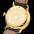 Fond de montre pour homme avec couvercle doré et bracelet en cuir marron