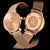 Deux montres pour femme : bracelet en maille couleur or rose, cadran beige et gravure au dos