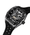 Herrenarmbanduhr: schwarzes Zifferblatt-Detail mit sichtbarer Mechanik und Krone