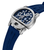 Herrenarmbanduhr seitlich, blaues Silikonarmband, silbernes Gehäuse, detailliertes blaues Uhrwerk