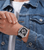 Herrenarmbanduhr Police Tough Gear am Handgelenk, silber-schwarz, Chronographen