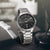 Lorus Herrenuhr mit rundem schwarzem Zifferblatt, Saphirglas und Edelstahlarmband