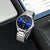 Lorus Herrenarmbanduhr, schräger Blick: blaues Zifferblatt, Edelstahlarmband, Saphirglas