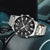 Herren-Armbanduhr mit Metallarmband, schwarzem Zifferblatt und Digitalanzeige