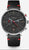 Montre homme avec cadran noir, bracelet en cuir noir et accents rouges sur le boîtier