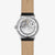 Montre automatique unisexe avec mouvement apparent, bracelet en cuir beige et boîtier argenté
