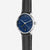 Sternglas Herrenarmbanduhr, blaues Zifferblatt, schwarzes Lederband mit Ziernähten