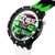 Swatch Armbanduhr mit schwarzer Lünette, weißem Armband und grünem Zifferblatt