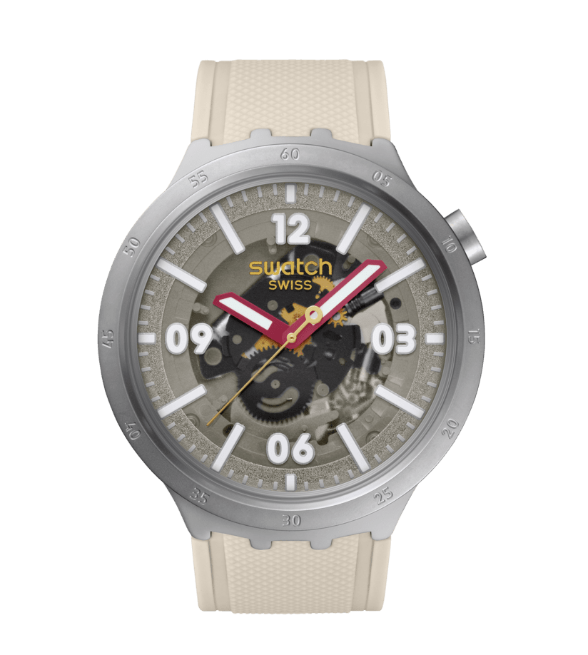 Runde Swatch-Uhr mit grauem Edelstahlgehäuse, beigem Textilarmband und Leuchtzeigern