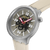 Swatch-Uhr im Detail: beiges Textilarmband, graues Gehäuse, schwarzes Zifferblatt