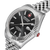 Herrenuhr: silbernes Edelstahlgehäuse mit geriffelter Lünette und schwarzem Zifferblatt