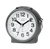 Réveil analogique JVD avec cadran blanc et aiguilles noires, boîtier gris.