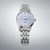 Montre automatique avec cadran bleu, boîtier argenté et bracelet en acier inoxydable
