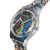 Armbanduhr im 3/4-Ansicht mit transparentem Rahmen und blau-schwarzem Spritzdekor