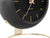 Horloge de table : boîtier sphérique noir, aiguilles et index dorés, anneau de cadran visible