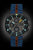 Bracelet avec bracelet en cuir bleu, cadran rond et index lumineux