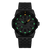 Montre de plongée noire avec index luminescents, guichet date rond et bracelet noir