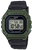Montre numérique Casio Vintage avec boîtier vert, bracelet noir et affichage numérique