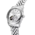 Automatikuhr mit silberfarbenem Edelstahlarmband, sichtbarer Mechanik im Zifferblatt und Krone