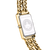 Damenarmbanduhr Rückseite mit Edelstahl-Aufdruck und goldfarbener Gliederkette