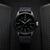 Herrenarmbanduhr Luminox, schwarzes Zifferblatt mit leuchtenden Indizes und Datumsfenster