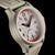 Montre homme avec boîtier beige, cadran orange et bracelet en caoutchouc gris