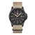 Montre homme avec bracelet textile beige et boîtier noir, chiffres luminescents