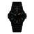 Bracelet de montre pour homme avec boîtier noir, cadran avec index lumineux verts et bracelet en caoutchouc