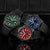 Aperçu : montres de plongée noires avec cadrans vert, bleu et rouge