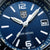 Montre pour femme avec cadran bleu, aiguilles lumineuses et guichet date à 3h