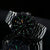 Montre chronographe pour homme avec boîtier en acier, cadran noir et index lumineux sur la lunette