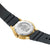Fond de montre pour homme avec motif en relief et bordure dorée, bracelet noir