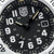 Cadran Luminox avec échelle noire, index argentés, aiguilles dorées, date