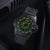 Montre homme sous faible luminosité : cadran vert avec index luminescents