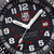 Cadran de montre Luminox avec logo LUMINOX-NOX, index rouges et guichet date à 3h