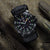 Luminox Navy SEAL XS. Montre avec cadran noir et points lumineux verts au bracelet