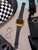 Casio Montre numérique avec boîtier doré et bracelet en métal noir, affichage numérique
