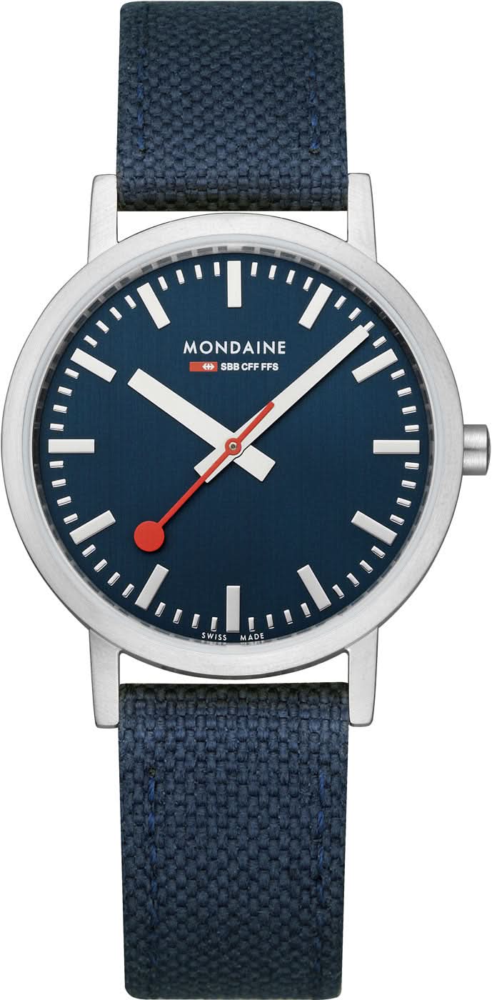 Montre unisexe avec cadran bleu, boîtier rond argenté et bracelet textile bleu foncé.