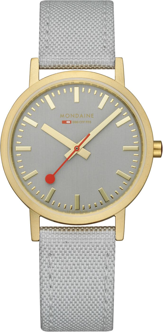 Montre unisexe Mondaine avec bracelet textile gris, lunette dorée et cadran gris