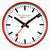 Horloge murale Mondaine avec cadre rouge, cadran blanc et aiguilles noires