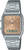 Montre Casio Vintage : bracelet en métal argenté, cadran beige avec affichage numérique, quartz