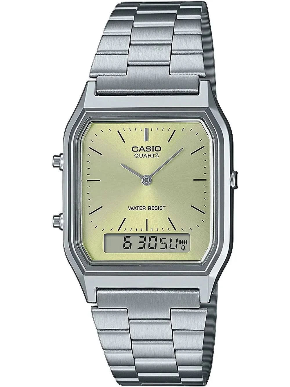 Montre vintage argentée avec bracelet en métal, cadran jaunâtre et affichage numérique